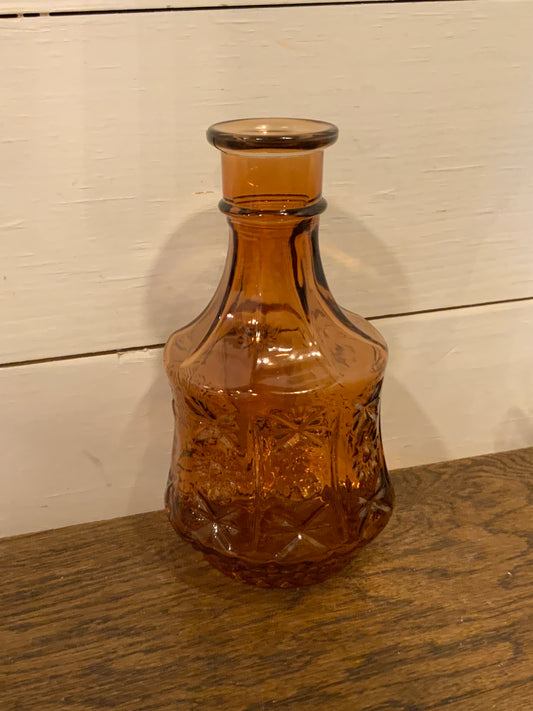 Floral embossed Amber bottle