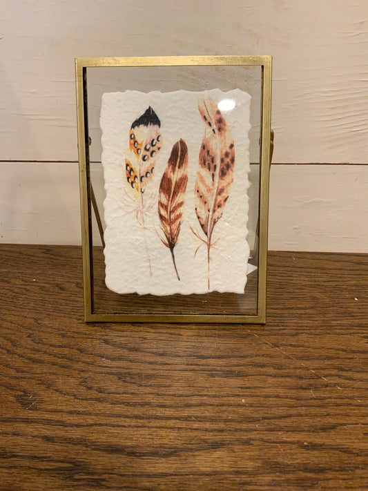 Gold frame w/ feather print