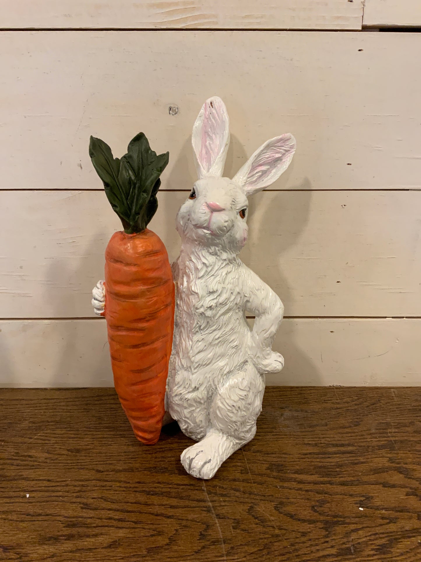 Bunny Holding A Carrot Sitter