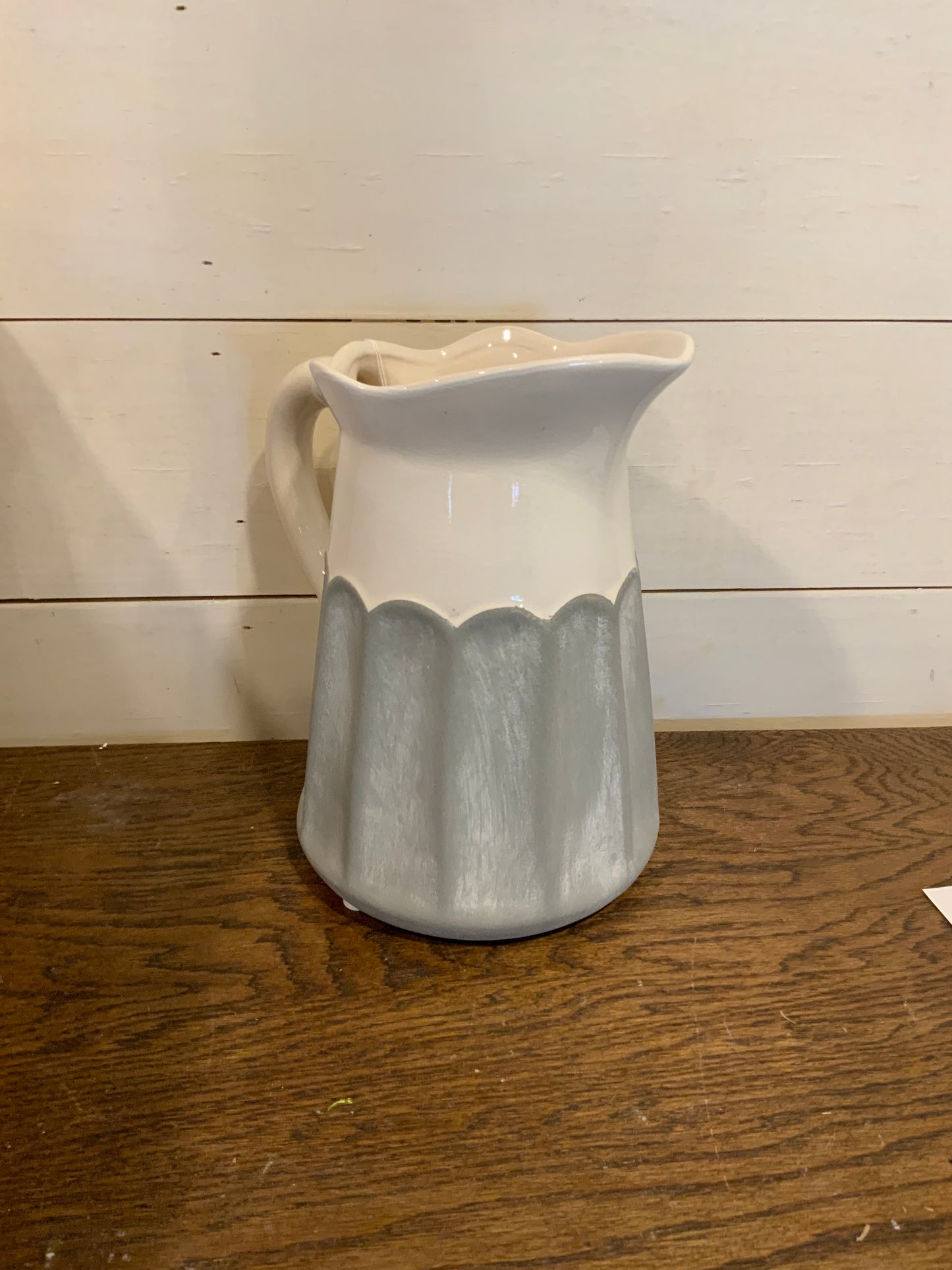 Old grey white pitcher