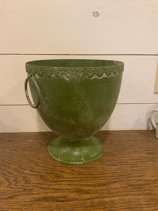 Aged green urn